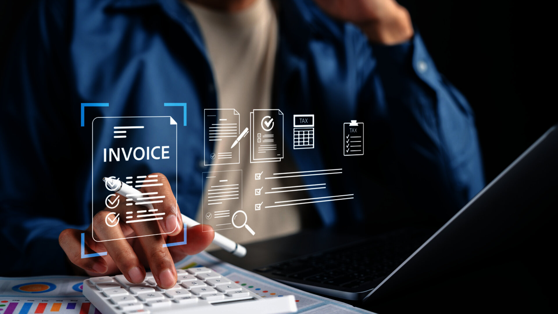 Employee using laptop and calculator with digital symbols for e-invoicing, automated invoice processing and tax documents.
