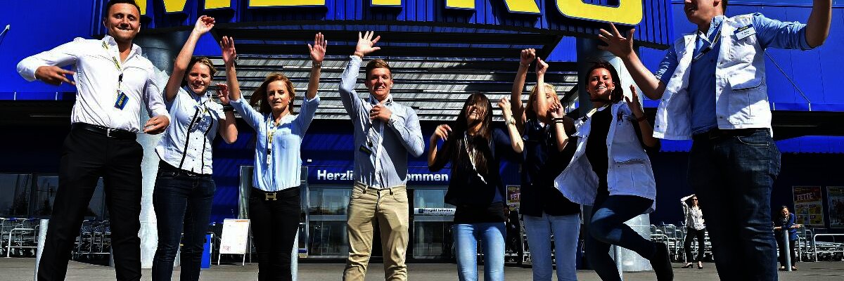 Metro employee in front of company building