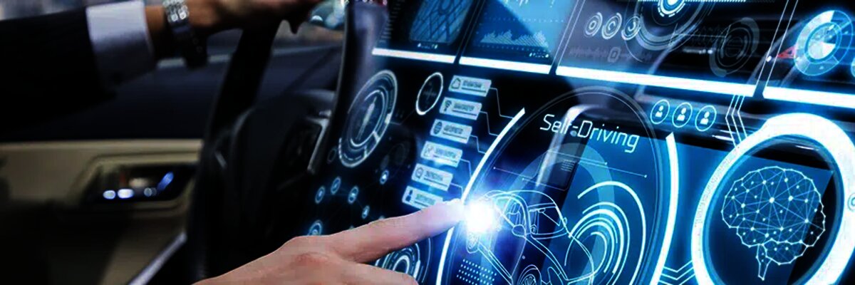 man-in-a-car-pressing-a-button - Alpine Electronics digitalization