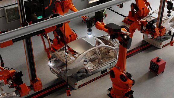 Robotic arms assembling a car frame in an automated factory, showcasing modern manufacturing technology