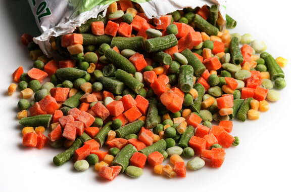 Close-up of an open bag of frozen vegetables