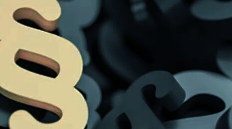 W miejscu centralnym na grafice znajduje się symbol paragraf "&sect;"