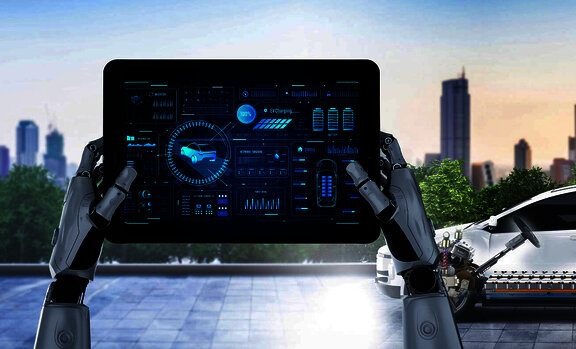 tablet v rukou robota s autem v pozad&iacute;