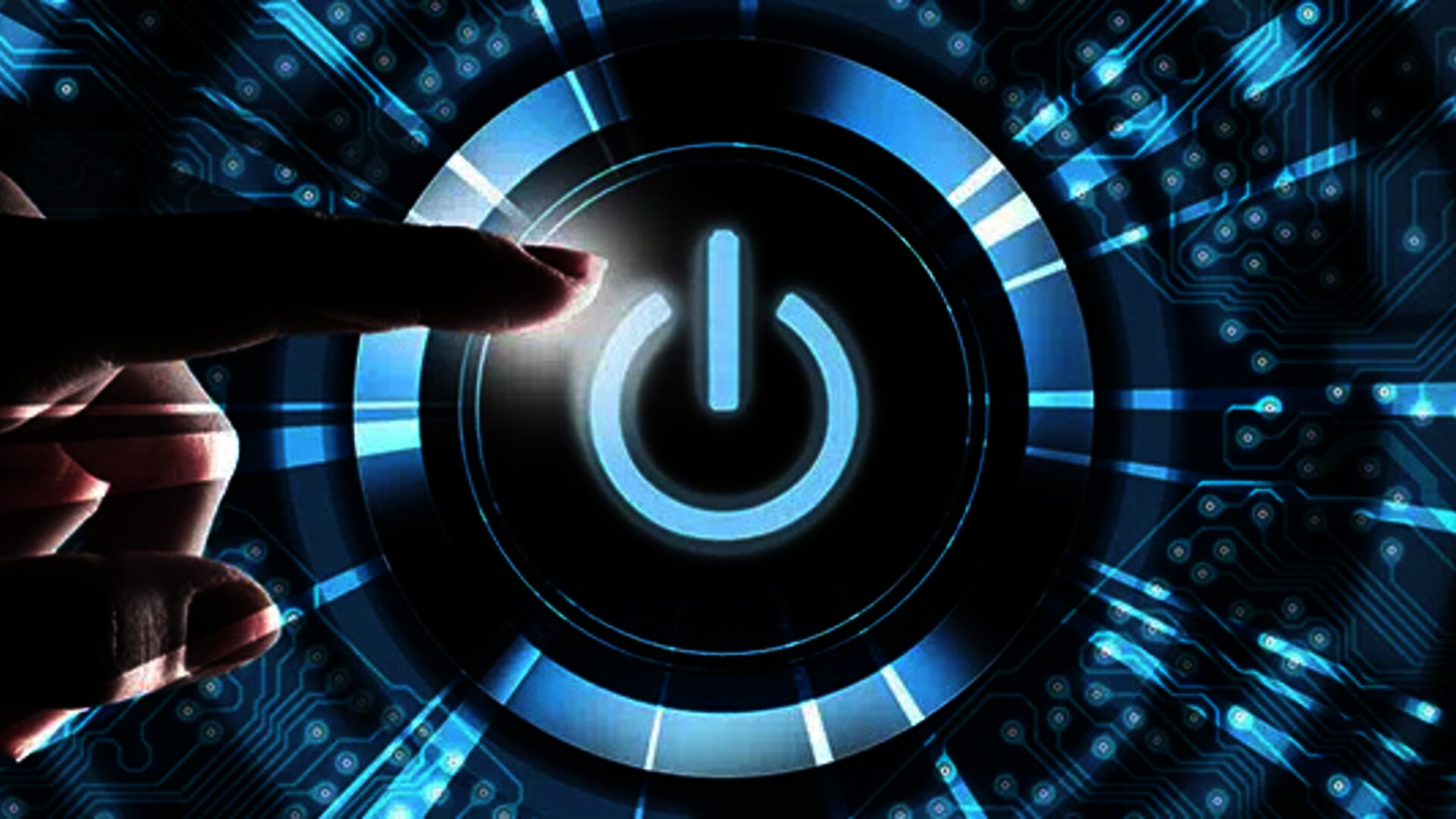 Hand operates the power button to start the digital processes for example with Web-EDI for SMEs