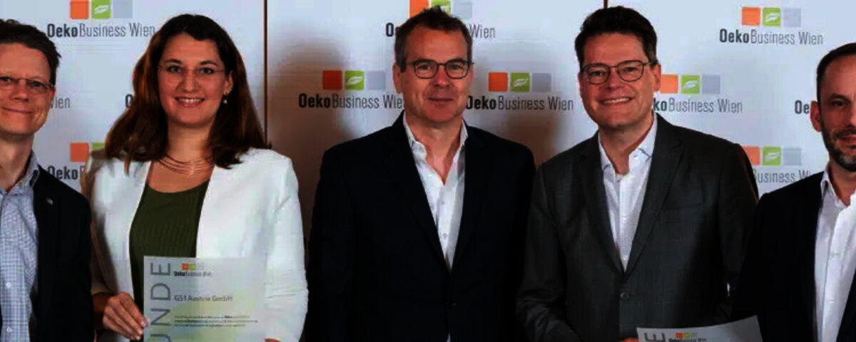 OekoBusiness winners posing in front of promo wall